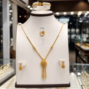 طقم الشمس، طقم ذهب عيار 21